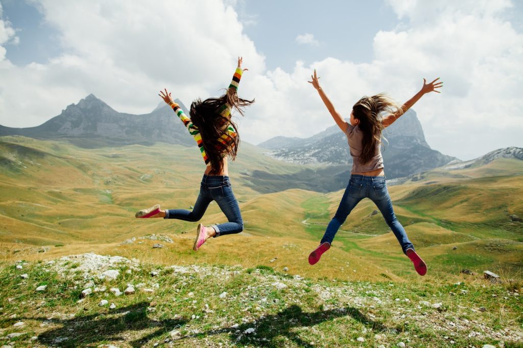 Happy people jumping