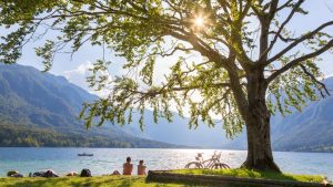 People-sunbathing-at-Bohinj-lake